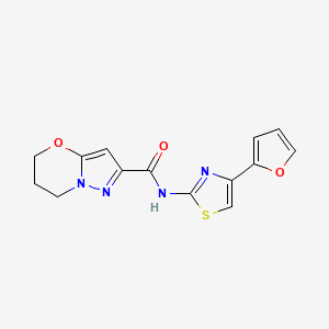 molecular formula C14H12N4O3S B2355925 N-(4-(furan-2-yl)thiazol-2-yl)-6,7-dihydro-5H-pyrazolo[5,1-b][1,3]oxazine-2-carboxamide CAS No. 1428363-98-7