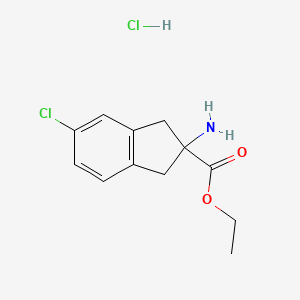 molecular formula C12H15Cl2NO2 B2356555 Ethyl 2-amino-5-chloro-2,3-dihydro-1H-indene-2-carboxylate hydrochloride CAS No. 1427501-68-5
