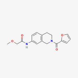 molecular formula C17H18N2O4 B2357308 N-(2-(呋喃-2-甲酰基)-1,2,3,4-四氢异喹啉-7-基)-2-甲氧基乙酰胺 CAS No. 955742-71-9