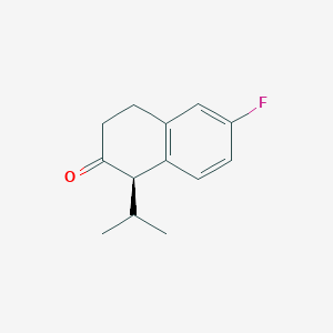 molecular formula C13H15FO B2357821 (R)-6-Fluoro-1-isopropyl-3,4-dihydronaphthalen-2(1H)-one CAS No. 2007909-26-2