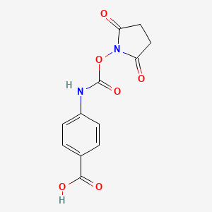 molecular formula C12H10N2O6 B2358065 4-[[[(2,5-dioxo-1-pyrrolidinyl)oxy]carbonyl]amino]Benzoic acid CAS No. 1178554-79-4