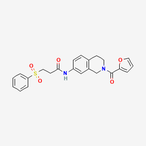 molecular formula C23H22N2O5S B2359002 N-(2-(furan-2-carbonyl)-1,2,3,4-tetrahydroisoquinolin-7-yl)-3-(phenylsulfonyl)propanamide CAS No. 1207028-80-5