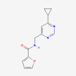 molecular formula C13H13N3O2 B2359697 N-[(6-シクロプロピルピリミジン-4-イル)メチル]フラン-2-カルボキサミド CAS No. 2195883-05-5