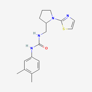 molecular formula C17H22N4OS B2363323 1-(3,4-Dimethylphenyl)-3-((1-(thiazol-2-yl)pyrrolidin-2-yl)methyl)urea CAS No. 1788769-44-7