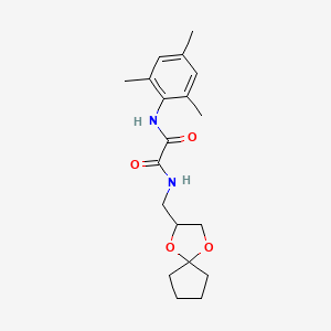 N1-(1,4-dioxaspiro[4.4]nonan-2-ylmethyl)-N2-mesityloxalamide