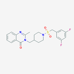 molecular formula C22H23F2N3O3S B2364533 3-[[1-[(3,5-Difluorophenyl)methylsulfonyl]piperidin-4-yl]methyl]-2-methylquinazolin-4-one CAS No. 2415603-67-5