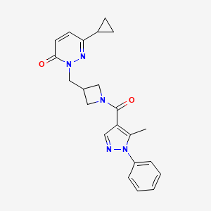 B2365490 6-Cyclopropyl-2-[[1-(5-methyl-1-phenylpyrazole-4-carbonyl)azetidin-3-yl]methyl]pyridazin-3-one CAS No. 2320212-18-6