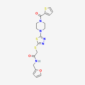 molecular formula C18H19N5O3S3 B2368919 N-(furan-2-ylmethyl)-2-((5-(4-(thiophene-2-carbonyl)piperazin-1-yl)-1,3,4-thiadiazol-2-yl)thio)acetamide CAS No. 1207029-73-9