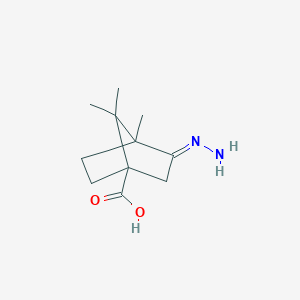 (3E)-3-hydrazinylidene-4,7,7-trimethylbicyclo[2.2.1]heptane-1-carboxylic acid