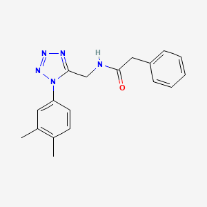 molecular formula C18H19N5O B2369715 N-((1-(3,4-dimethylphenyl)-1H-tetrazol-5-yl)methyl)-2-phenylacetamide CAS No. 920432-56-0