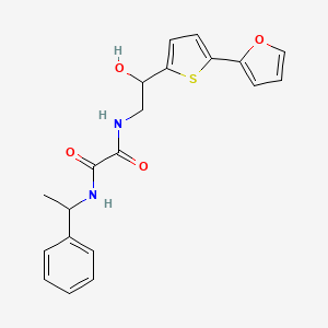 molecular formula C20H20N2O4S B2369937 N-[2-[5-(Furan-2-yl)thiophen-2-yl]-2-hydroxyethyl]-N'-(1-phenylethyl)oxamide CAS No. 2320860-10-2
