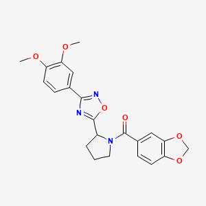 molecular formula C22H21N3O6 B2370233 5-[1-(1,3-Benzodioxol-5-ylcarbonyl)pyrrolidin-2-yl]-3-(3,4-dimethoxyphenyl)-1,2,4-oxadiazole CAS No. 1795411-38-9