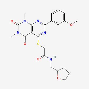 2-((2-(3-methoxyphenyl)-6,8-dimethyl-5,7-dioxo-5,6,7,8-tetrahydropyrimido[4,5-d]pyrimidin-4-yl)thio)-N-((tetrahydrofuran-2-yl)methyl)acetamide