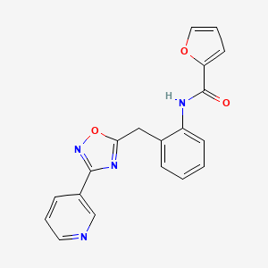 N-(2-((3-(pyridin-3-yl)-1,2,4-oxadiazol-5-yl)methyl)phenyl)furan-2-carboxamide