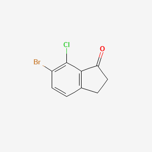 molecular formula C9H6BrClO B2370872 6-Bromo-7-chloro-2,3-dihydro-1H-inden-1-one CAS No. 1337850-20-0