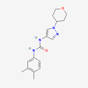molecular formula C17H22N4O2 B2370895 1-(3,4-dimethylphenyl)-3-(1-(tetrahydro-2H-pyran-4-yl)-1H-pyrazol-4-yl)urea CAS No. 1797866-93-3