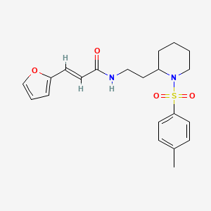 molecular formula C21H26N2O4S B2372776 (E)-3-(呋喃-2-基)-N-(2-(1-甲苯磺酰哌啶-2-基)乙基)丙烯酰胺 CAS No. 1331424-51-1