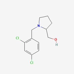 molecular formula C12H15Cl2NO B2373288 [1-(2,4-Dichloro-benzyl)-pyrrolidin-2-yl]-methanol CAS No. 415946-99-5