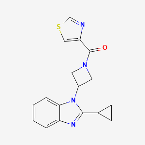 molecular formula C17H16N4OS B2376117 [3-(2-Cyclopropylbenzimidazol-1-yl)azetidin-1-yl]-(1,3-thiazol-4-yl)methanone CAS No. 2379977-34-9