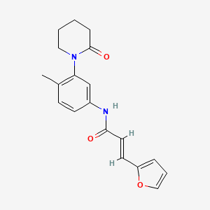 (E)-3-(furan-2-yl)-N-(4-methyl-3-(2-oxopiperidin-1-yl)phenyl)acrylamide