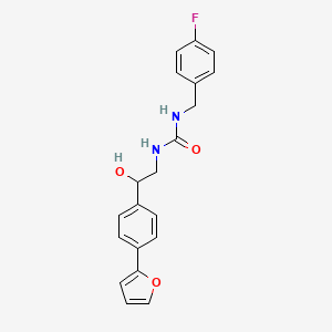1-[(4-Fluorophenyl)methyl]-3-{2-[4-(furan-2-yl)phenyl]-2-hydroxyethyl}urea