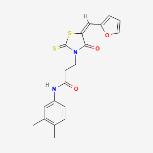 (E)-N-(3,4-dimethylphenyl)-3-(5-(furan-2-ylmethylene)-4-oxo-2-thioxothiazolidin-3-yl)propanamide
