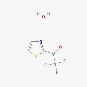 molecular formula C5H4F3NO2S B2377759 2-(トリフルオロアセチル)チアゾール一水和物 CAS No. 2097800-30-9