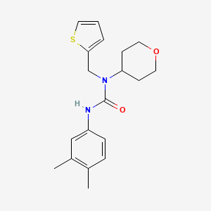 3-(3,4-dimethylphenyl)-1-(tetrahydro-2H-pyran-4-yl)-1-(thiophen-2-ylmethyl)urea