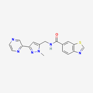 molecular formula C17H14N6OS B2379953 N-((1-methyl-3-(pyrazin-2-yl)-1H-pyrazol-5-yl)methyl)benzo[d]thiazole-6-carboxamide CAS No. 2034288-61-2