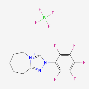 molecular formula C13H11BF9N3 B2379975 2-(Perfluorophenyl)-6,7,8,9-tetrahydro-5H-[1,2,4]triazolo[4,3-a]azepin-2-ium tetrafluoroborate CAS No. 1609525-91-8