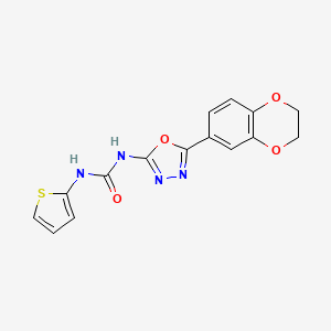 molecular formula C15H12N4O4S B2380455 1-(5-(2,3-Dihydrobenzo[b][1,4]dioxin-6-yl)-1,3,4-oxadiazol-2-yl)-3-(thiophen-2-yl)urea CAS No. 1207006-56-1