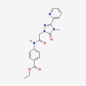 molecular formula C19H19N5O4 B2381155 ethyl 4-(2-(4-methyl-5-oxo-3-(pyridin-2-yl)-4,5-dihydro-1H-1,2,4-triazol-1-yl)acetamido)benzoate CAS No. 1795295-17-8