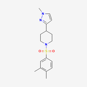 molecular formula C17H23N3O2S B2381261 1-((3,4-dimethylphenyl)sulfonyl)-4-(1-methyl-1H-pyrazol-3-yl)piperidine CAS No. 2034202-28-1