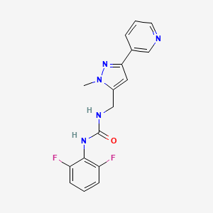 molecular formula C17H15F2N5O B2381393 1-(2,6-difluorophenyl)-3-((1-methyl-3-(pyridin-3-yl)-1H-pyrazol-5-yl)methyl)urea CAS No. 2034551-63-6