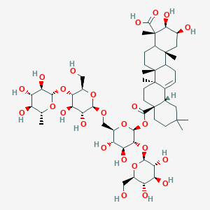molecular formula C54H86O25 B2382247 (2S,3R,4S,6aR,6bS,8aS,12aS,14bR)-8a-[(2S,3R,4S,5S,6R)-6-[[(2R,3R,4R,5S,6R)-3,4-dihydroxy-6-(hydroxymethyl)-5-[(2S,3R,4S,5S,6R)-3,4,5-trihydroxy-6-methyloxan-2-yl]oxyoxan-2-yl]oxymethyl]-4,5-dihydroxy-3-[(2S,3R,4S,5S,6R)-3,4,5-trihydroxy-6-(hydroxymethyl)oxan-2-yl]oxyoxan-2-yl]oxycarbonyl-2,3-dihydroxy-4,6a,6b,11,11,14b-hexamethyl-1,2,3,4a,5,6,7,8,9,10,12,12a,14,14a-tetradecahydropicene-4-carboxylic acid CAS No. 177263-83-1