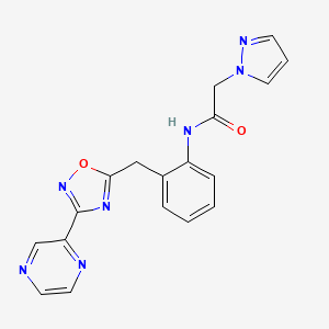 molecular formula C18H15N7O2 B2382636 N-(2-((3-(pyrazin-2-yl)-1,2,4-oxadiazol-5-yl)methyl)phenyl)-2-(1H-pyrazol-1-yl)acetamide CAS No. 2034535-66-3