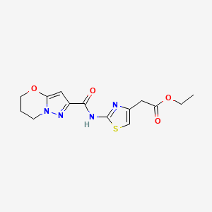 molecular formula C14H16N4O4S B2383645 ethyl 2-(2-(6,7-dihydro-5H-pyrazolo[5,1-b][1,3]oxazine-2-carboxamido)thiazol-4-yl)acetate CAS No. 1448052-85-4