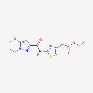 molecular formula C14H16N4O4S B2383645 2-(2-(6,7-ジヒドロ-5H-ピラゾロ[5,1-b][1,3]オキサジン-2-カルボキサミド)チアゾール-4-イル)酢酸エチル CAS No. 1448052-85-4