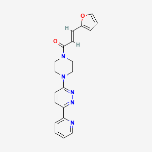 (E)-3-(furan-2-yl)-1-(4-(6-(pyridin-2-yl)pyridazin-3-yl)piperazin-1-yl)prop-2-en-1-one