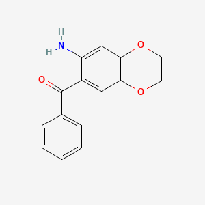 molecular formula C15H13NO3 B2383849 (7-Amino-2,3-dihydro-benzo[1,4]dioxin-6-yl)-phenyl-methanone CAS No. 164526-15-2
