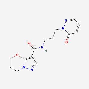 molecular formula C14H17N5O3 B2384268 N-(3-(6-oxopyridazin-1(6H)-yl)propyl)-6,7-dihydro-5H-pyrazolo[5,1-b][1,3]oxazine-3-carboxamide CAS No. 1421469-50-2