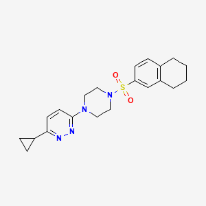 molecular formula C21H26N4O2S B2384705 3-Cyclopropyl-6-(4-((5,6,7,8-tetrahydronaphthalen-2-yl)sulfonyl)piperazin-1-yl)pyridazine CAS No. 2034469-75-3
