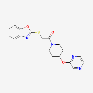 molecular formula C18H18N4O3S B2384746 2-(Benzo[d]oxazol-2-ylthio)-1-(4-(pyrazin-2-yloxy)piperidin-1-yl)ethanone CAS No. 1448072-09-0