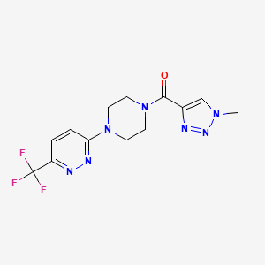 B2384922 (1-Methyltriazol-4-yl)-[4-[6-(trifluoromethyl)pyridazin-3-yl]piperazin-1-yl]methanone CAS No. 2380180-03-8