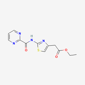 molecular formula C12H12N4O3S B2385644 Ethyl 2-(2-(pyrimidine-2-carboxamido)thiazol-4-yl)acetate CAS No. 1286697-43-5