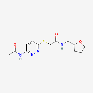 2-((6-acetamidopyridazin-3-yl)thio)-N-((tetrahydrofuran-2-yl)methyl)acetamide