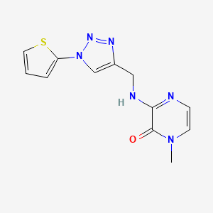 molecular formula C12H12N6OS B2386565 1-Methyl-3-[(1-thiophen-2-yltriazol-4-yl)methylamino]pyrazin-2-one CAS No. 2380194-04-5