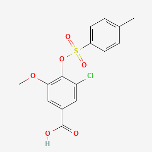 molecular formula C15H13ClO6S B2387140 3-Chloro-5-methoxy-4-{[(4-methylphenyl)sulfonyl]oxy}benzoic acid CAS No. 1050894-27-3