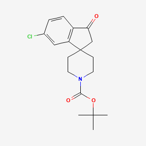 molecular formula C18H22ClNO3 B2387450 Tert-butyl 6-chloro-3-oxo-2,3-dihydrospiro[indene-1,4'-piperidine]-1'-carboxylate CAS No. 855849-90-0