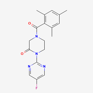 molecular formula C18H19FN4O2 B2388170 1-(5-Fluoropyrimidin-2-yl)-4-(2,4,6-trimethylbenzoyl)piperazin-2-one CAS No. 2319725-24-9
